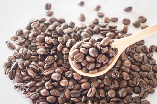 Spoon of roasted coffee bean, stock photo