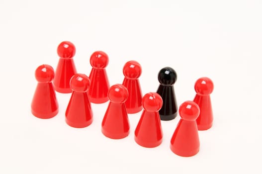 Still lifes: Group of 9 red and one black man-angry-you-not-figures in block of tens to two rows on white background