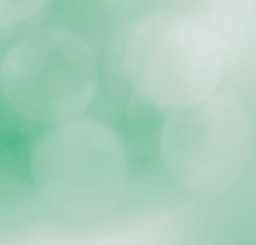 De-focused lights bokeh abstract on green background