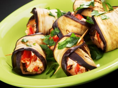Eggplant rolls filled with cheese, peppers and parsley