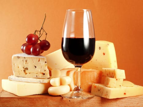 Glass of red wine and blue cheese