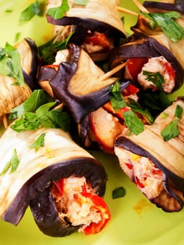 Eggplant rolls filled with cheese, peppers and parsley