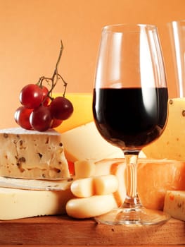 Glass of red wine and blue cheese