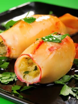 Stuffed squids with potatos and herbs