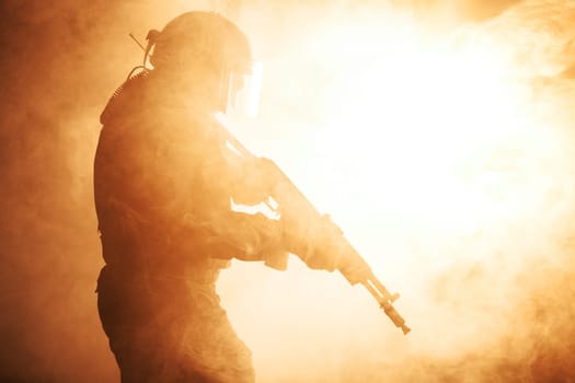 Russian special forces operator in bulletproof helmet in the smoke and fire