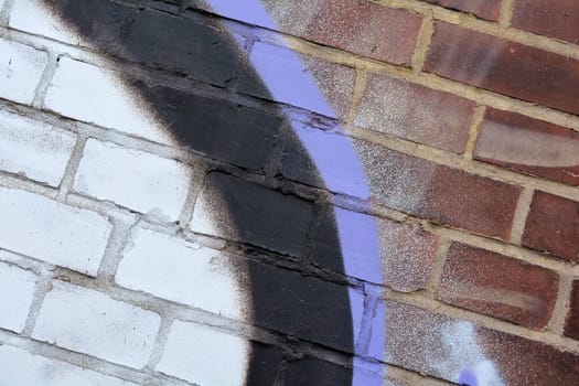 Detail of graffiti on a house wall
