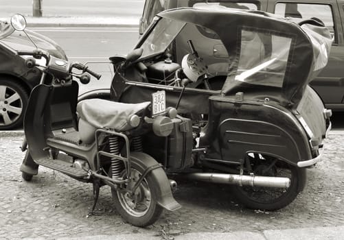 Simson scooter and Krause duo from GDR production on the roadside in Berlin