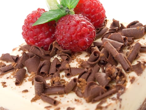 Cheesecake with chocolate and raspberries