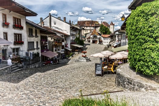 Main street in Gruyeres village by day, Fribourg, Switzerland