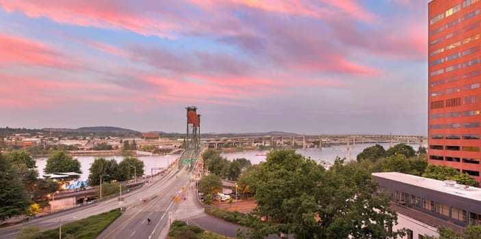 Portland Oregon downtown city waterfront and Hawthorne Bridge Tilikum Crossing Marquam Bridge over Willamette River during alpenglow sunset