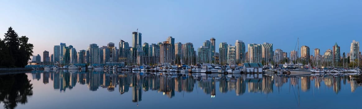 Vancouver British Columbia Canada City Skyline by the Harbor View from Stanley Park along False Creek at Sunrise Panorama