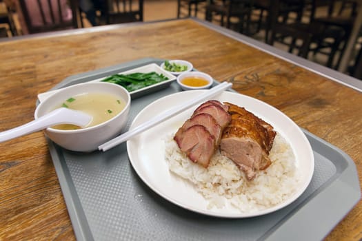 Roast Duck and Barbecue Pork Over Rice Dish in Hong Kong Restaurant
