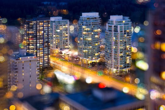 Vancouver British Columbia Cityscape with Blurred Defocused City Lights During Evening Blue Hour