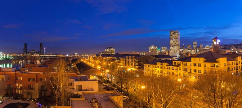 Portland Oregon Downtown Waterfront Cityscape with Steel Bridge during Evening Blue Hour Panorama