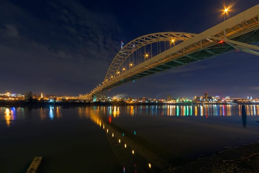 Fremont Bridge Over Willamette River in Portland Oregon Industrial Area at Night