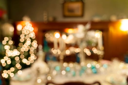 Christmas Day Holiday Celebration Dinner Table Decorations Blurred Defocused Bokeh Background Closeup
