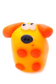 Orange dog made of polymer clay