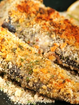 Crunchy Oven-Fried Fish with croutons and parmesan cheese