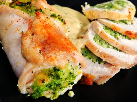 Stuffed chicken rolls with broccoli and vegetables