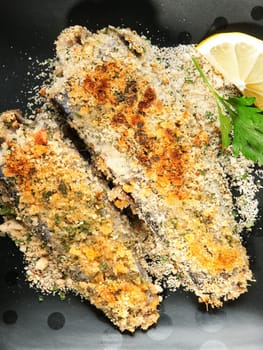 Crunchy Oven-Fried Fish with croutons and parmesan cheese