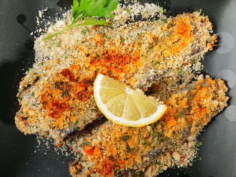 Crunchy Oven-Fried Fish with croutons and parmesan cheese