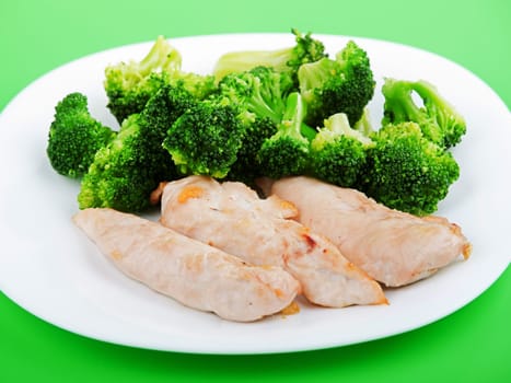 Roasted chicken breasts with boiled broccoli