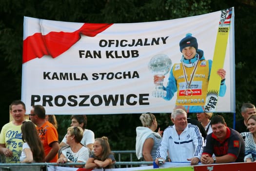 Polish fans keep their fingers crossed for Kamil Stoch - Men's Singles Competition - FIS Summer Grand Prix