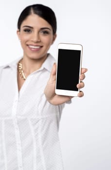 Pretty female representative showing new mobile phone