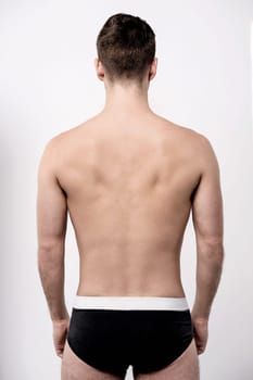 Perfect fit man from the back in underwear