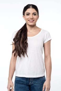Image of a beautiful woman casually posing to camera