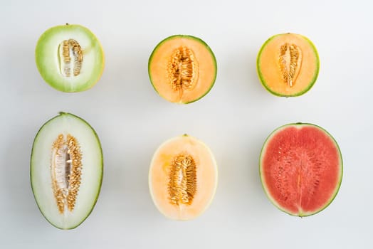 Collection of various sliced melon varieties on one table