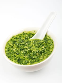 Pesto sauce isolated on white