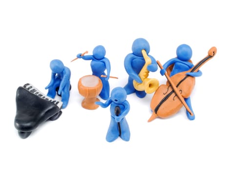 Many plasticine people performing a song