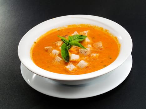 Italian soup with roasted tomatoes and peppers
