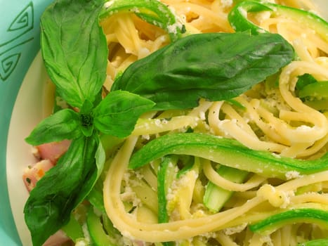 Linguini prepared with fried zucchini, eggs, basil and parmesan cheese