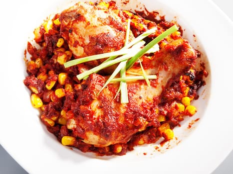 Mexican chicken with corn and tomatos