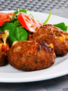 Meatballs with corn and cheese