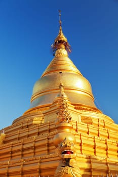The Maha Lawka Marazein Pagoda at the center of the Kuthodaw Pagoda. Kuthodaw Pagoda is a Buddhist stupa, located in Mandalay, Burma (Myanmar), that contains the world's largest book. It lies at the foot of Mandalay Hill. In the grounds of the pagoda are 729 stone-inscription caves, each containing a marble slab inscribed on both sides with a page of text from the Tipitaka, the entire Pali Canon of Theravada Buddhism. Pagoda Kuthodaw stretching from 1860 to 1868 during the reign of King Mindona.