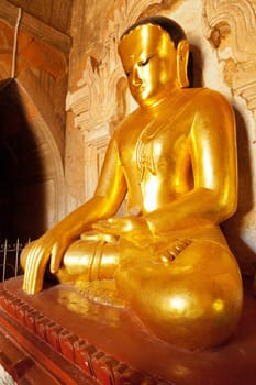 Close up of statue of Bhudda in earth-touching mudra. Photo taken in Ananda Temple, Bagan, Myanmar