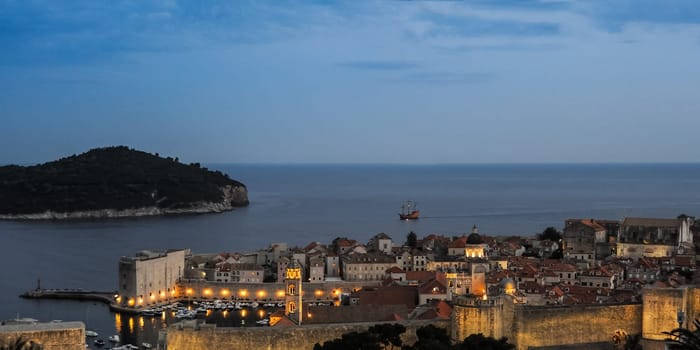 Sailing ship at dusk off Dubrovnik