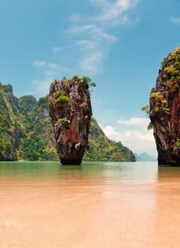Khao Phing Kan is a pair of islands on the west coast of Thailand, in the Phang Nga Bay, Andaman Sea, near Phuket. About 40 metres from its shores lies a 20 meters tall islet Ko Tapu or Khao Tapu. The island is a part of the Ao Phang Nga National Park. Since 1974, when it was featured in the James Bond movie The Man with the Golden Gun, it is popularly called James Bond Island.