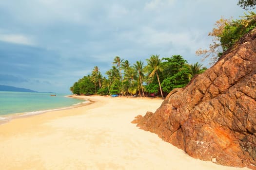 Koh Samui beach with palm trees and white sand