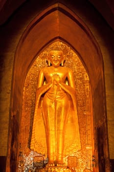 Golden statue of Buddha in Ananda Temple in Bagan, Myanmar