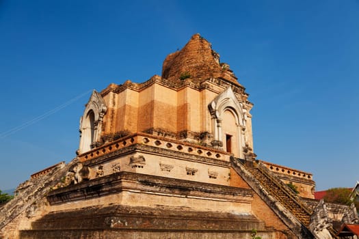 Wat Chedi Luang is a Buddhist temple in the historic centre of Chiang Mai, Thailand. The current temple grounds were originally made up of three temples — Wat Chedi Luang, Wat Ho Tham and Wat Sukmin.