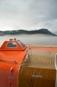 A pod designed to save 150 people is secured to a ferry boat