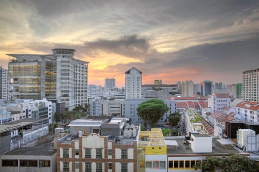 Bugis Junction Area in Singapore with Modern and Traditional Buildings Cityscape at Sunset