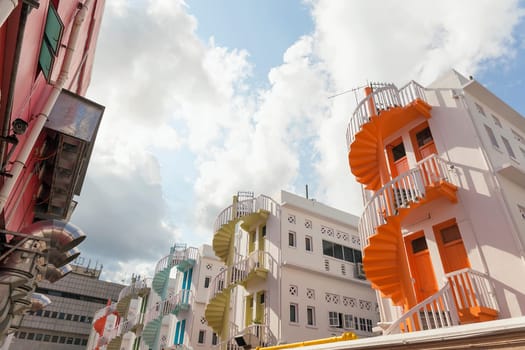 Colorful Row of Spiral Staircase in the Back Alley of Bugis Village Area in Singapore