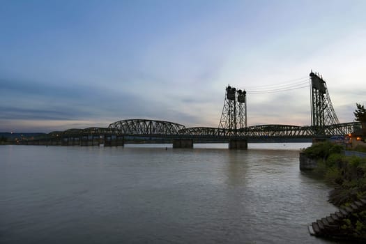 Interstate Bridge I-5 Over Columbia River Waterfront After Sunset at Dusk Between Oregon and Washington States