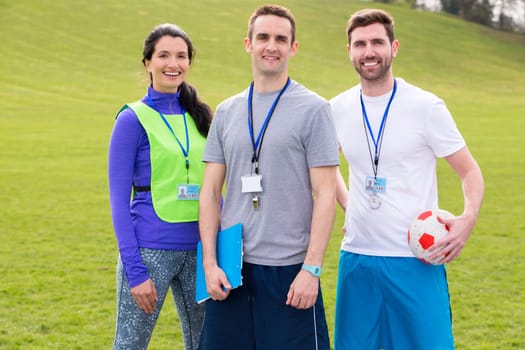 Small group of PE teachers smiling for a portrait
