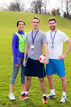 Small group of PE teachers smiling for a portrait